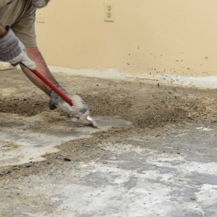 A member of our professional team preparing floors for installation in Redlands, CA