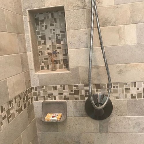 Shower renovation with glass tile accents in Redlands, CA from Stafford's Discount Carpets